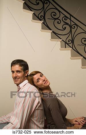 Couple back to back View Large Photo Image Stock Photography - Couple back to back. Fotosearch