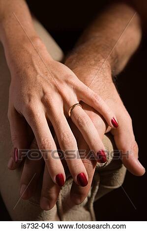 Couple touching hands View Large Photo Image Stock Image - Couple touching hands. Fotosearch