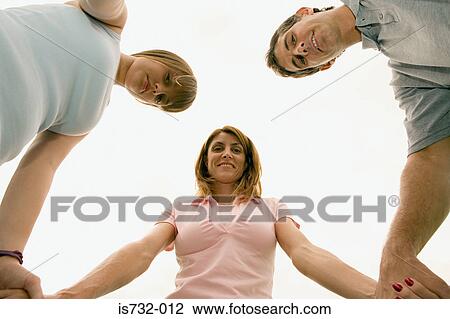 Family holding hands View Large Photo Image Stock Image - Family holding hands. Fotosearch