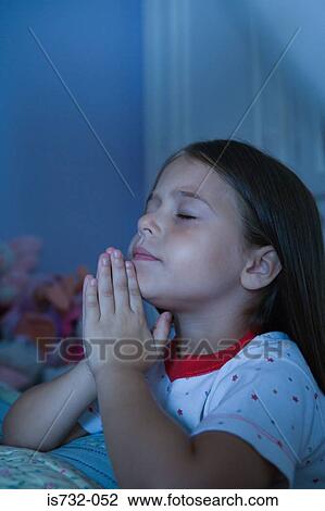 Girl praying View Large Photo Image Stock Image - Girl praying. Fotosearch
