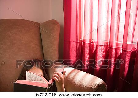 Girl reading the bible View Large Photo Image Stock Photograph - Girl reading the bible. Fotosearch