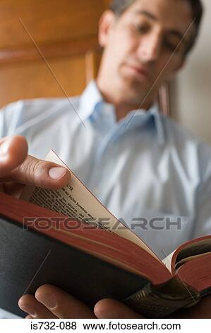 Man reading the bible View Large Photo Image Stock Photo - Man reading the bible. Fotosearch