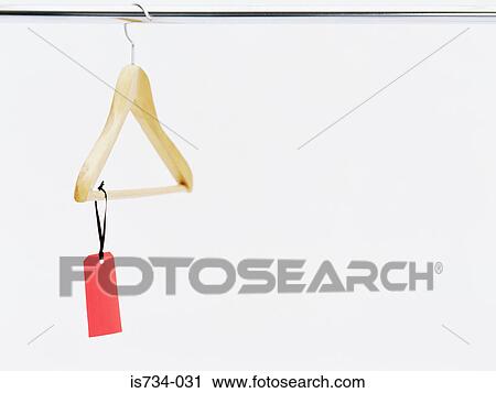 Stock Image - Label on a coathanger. Fotosearch