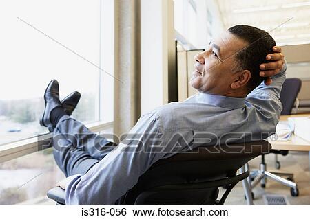 Businessman relaxing View Large Photo Image Stock Photograph - Businessman relaxing. Fotosearch