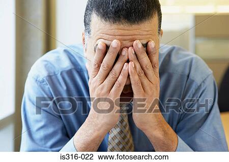 Stock Image - Stressed businessman. Fotosearch