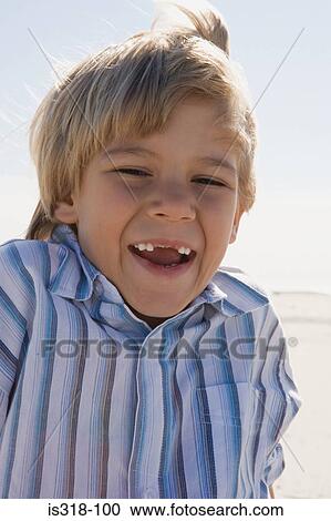 Stock Image - Laughing boy. Fotosearch