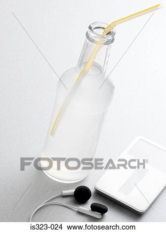 Alcopop and mp3 player View Large Photo Image Picture - Alcopop and mp3 player. Fotosearch