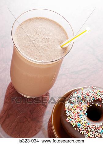 Chocolate milkshake and doughnut View Large Photo Image Picture - Chocolate milkshake and doughnut. Fotosearch