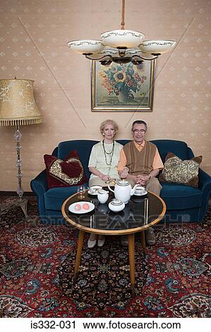 Stock Image - Couple having tea. Fotosearch