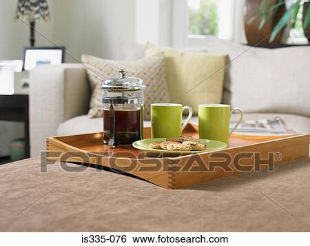 Coffee and biscuits on a tray View Large Photo Image Stock Photograph - Coffee and biscuits on a tray. Fotosearch