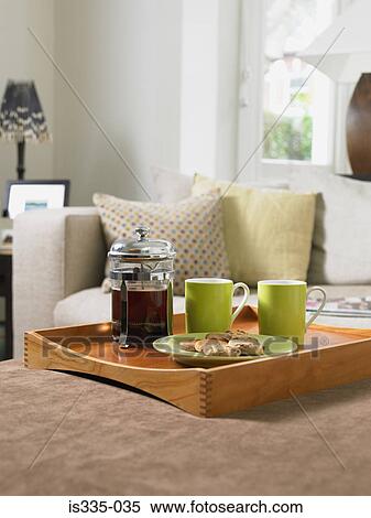 Stock Photography - Coffee and biscuits on a tray. Fotosearch