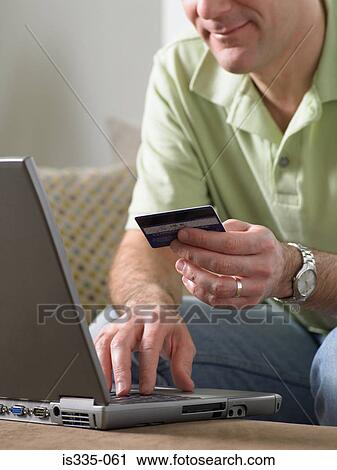 Man shopping on the internet View Large Photo Image Stock Image - Man shopping on the internet. Fotosearch