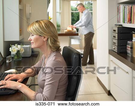 Stock Image - Mature couple at home. Fotosearch