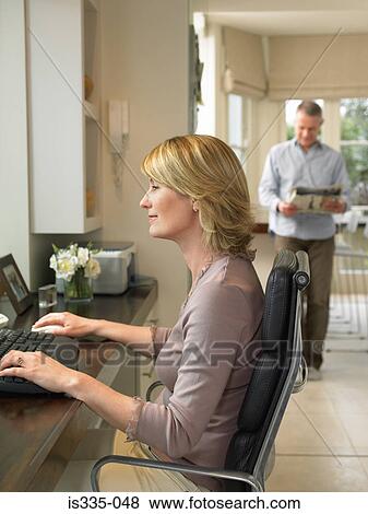 Mature couple at home View Large Photo Image Stock Photo - Mature couple at home. Fotosearch