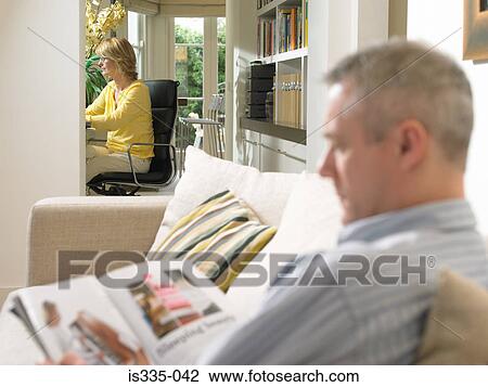 Mature couple resting at home View Large Photo Image Stock Image - Mature couple resting at home. Fotosearch