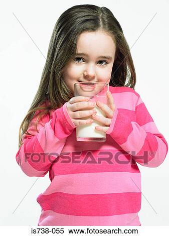 Girl with a glass of milk View Large Photo Image Stock Photography - Girl with a glass of milk. Fotosearch