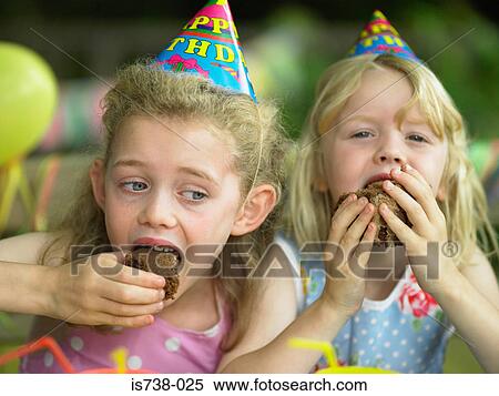 Girls eating chocolate cake View Large Photo Image Stock Photography - Girls eating chocolate cake. Fotosearch