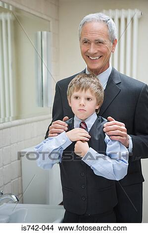 Boy and grandfather in suits View Large Photo Image Picture - Boy and grandfather in suits. Fotosearch