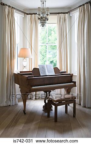 Piano by a window View Large Photo Image Stock Image - Piano by a window. Fotosearch