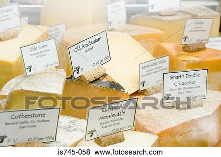 Stock Photo - Cheese in a counter. Fotosearch
