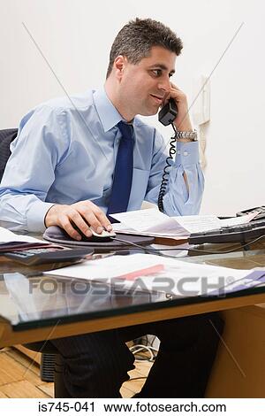 Estate agent on the phone View Large Photo Image Stock Image - Estate agent on the phone. Fotosearch