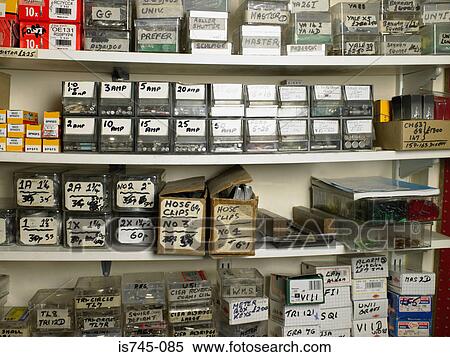 Shelves of boxes in a hardware store View Large Photo Image Stock Photography - Shelves of boxes in a hardware store. Fotosearch