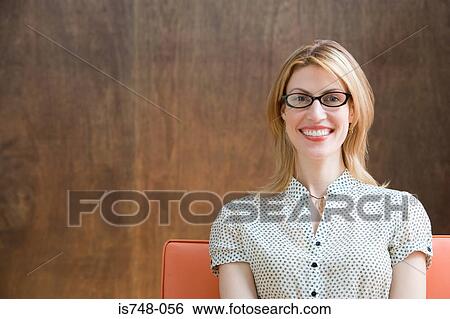 Young woman smiling View Large Photo Image Stock Photograph - Young woman smiling. Fotosearch