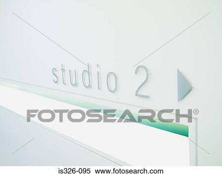 Direction sign on wall in health club View Large Photo Image Stock Photography - Direction sign on wall in health club. Fotosearch