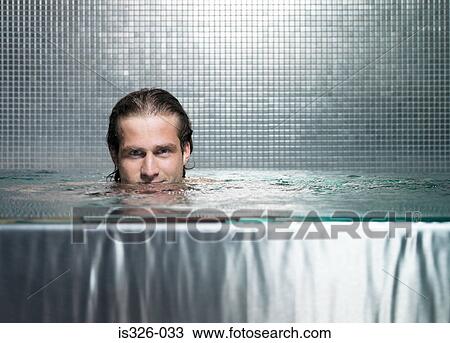 Man immersing in jacuzzi View Large Photo Image Stock Image - Man immersing in jacuzzi . Fotosearch