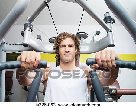 Man weight training View Large Photo Image Stock Image - Man weight training . Fotosearch