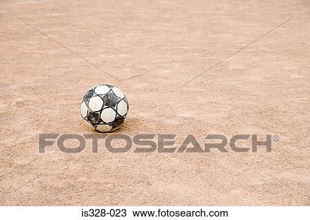 Football on gravel View Large Photo Image Stock Image - Football on gravel. Fotosearch