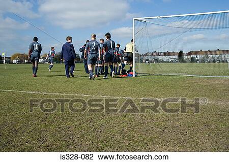 Football team leaving pitch View Large Photo Image Stock Image - Football team leaving pitch. Fotosearch