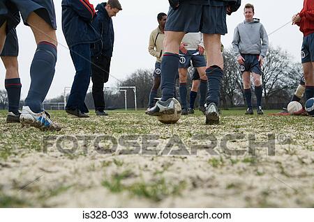 Football team warming up View Large Photo Image Stock Image - Football team warming up. Fotosearch