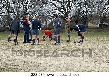 Stock Photo - Football team warming up. Fotosearch
