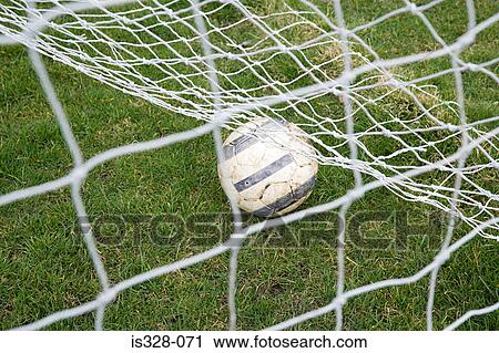 Football under net View Large Photo Image Stock Image - Football under net. Fotosearch