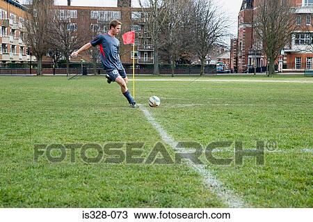 Footballer taking a corner View Large Photo Image Stock Image - Footballer taking a corner. Fotosearch