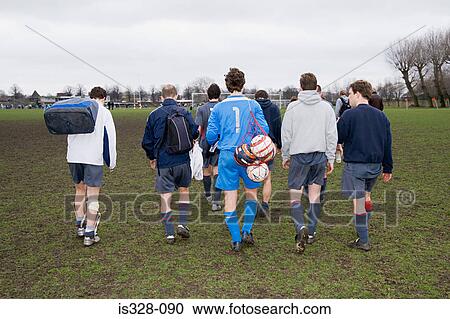 Footballer walking onto pitch View Large Photo Image Stock Image - Footballer walking onto pitch. Fotosearch