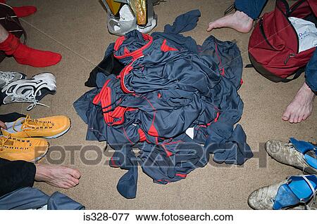 Footballers and their uniforms in changing room View Large Photo Image Stock Photo - Footballers and their uniforms in changing room. Fotosearch