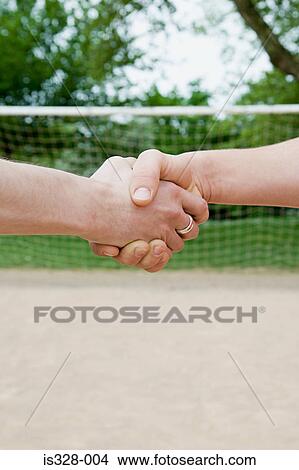 Picture - Footballers shaking hands. Fotosearch