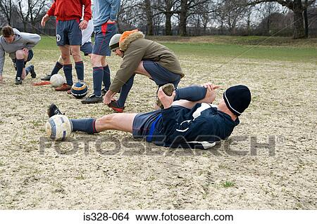 Footballers warming up View Large Photo Image Picture - Footballers warming up. Fotosearch