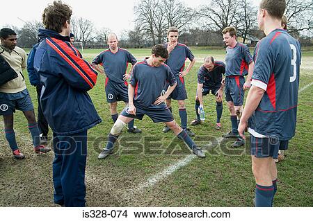 Footballers warming up View Large Photo Image Picture - Footballers warming up. Fotosearch