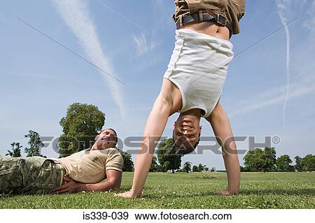 Stock Photo - Gay couple fooling around. Fotosearch