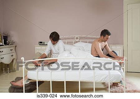 Picture - Gay couple wiping feet. Fotosearch