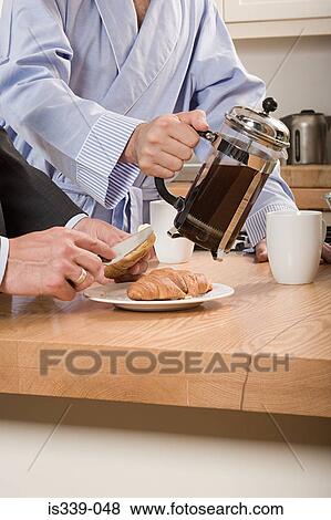 Stock Photo - Having breakfast. Fotosearch
