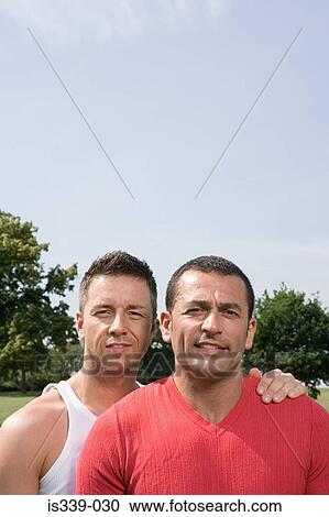 Portrait of a gay couple View Large Photo Image Stock Image - Portrait of a gay couple. Fotosearch