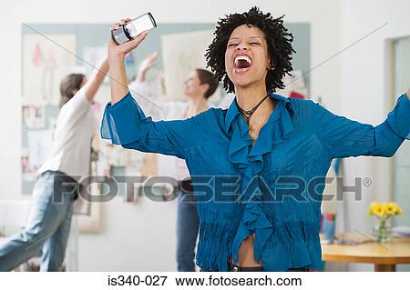 Stock Photo - Elated woman. Fotosearch