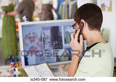Stock Photo - Fashion designer at work. Fotosearch