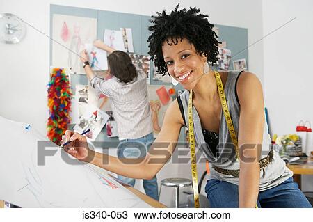 Fashion designer drawing View Large Photo Image Stock Image - Fashion designer drawing. Fotosearch