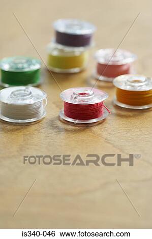 Spools of cotton View Large Photo Image Stock Photograph - Spools of cotton. Fotosearch