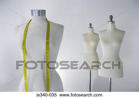 Tailors dummy with tape measure View Large Photo Image Stock Photography - Tailors dummy with tape measure. Fotosearch